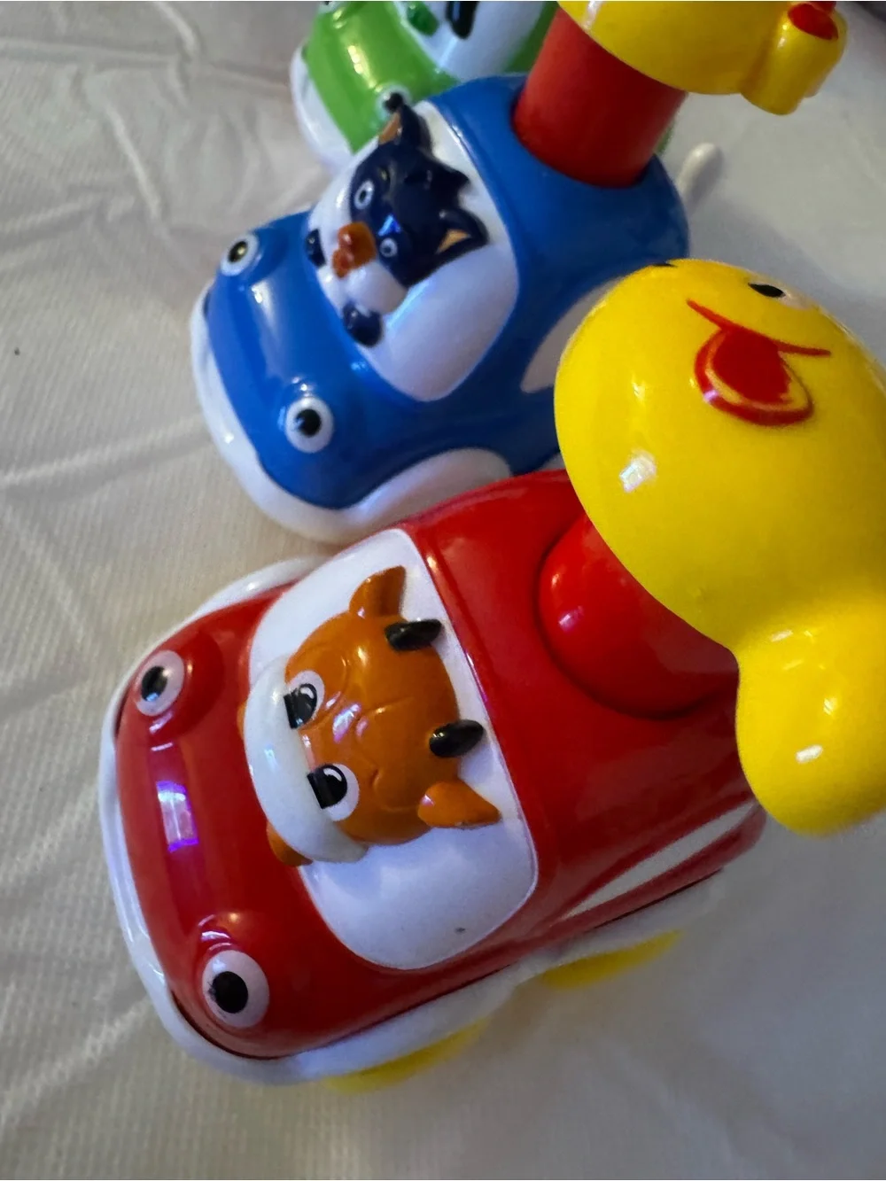Colorful Wind-Up Animal Cars Toy Trio - Red, Blue, Green